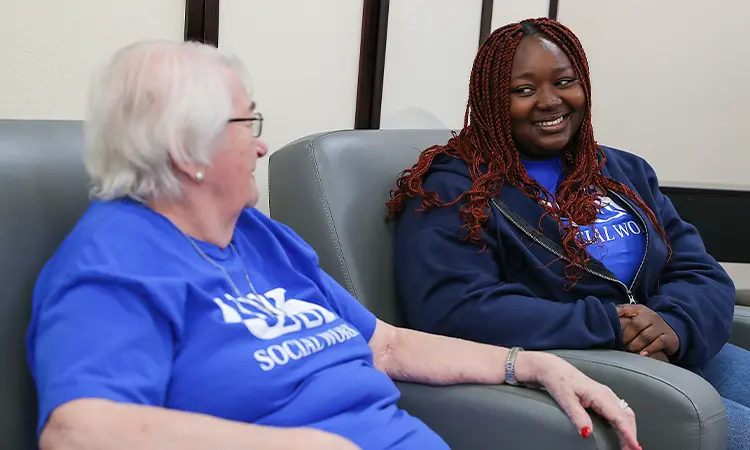 a unk social work student works with an elderly woman