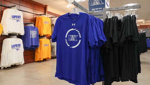 a rack of unk shirts