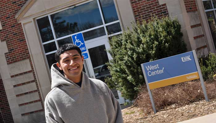Omar in front of the West Center