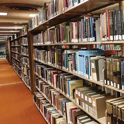 Shelf of books in the Calvin T. Ryan Library