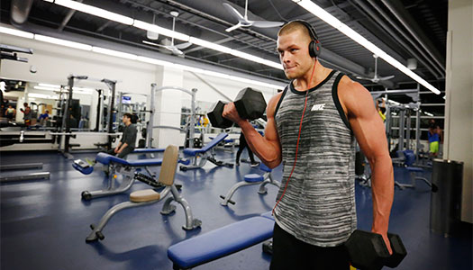 Guy lifting weights