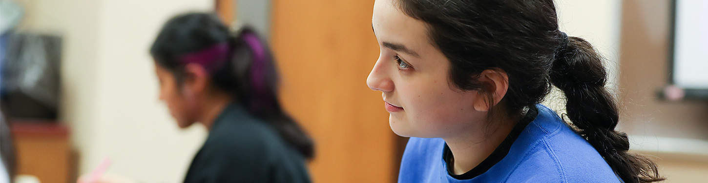 a student sits in class