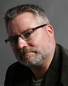 Dr. Christopher Strickland