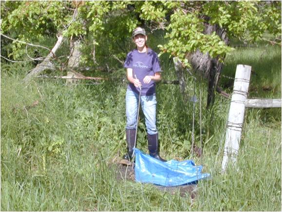 Biology student out in the field