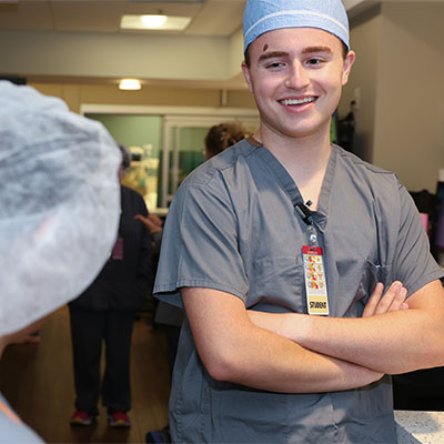 a student wearing scrubs