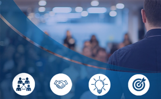 a stock photo of a man speaking to a crowd