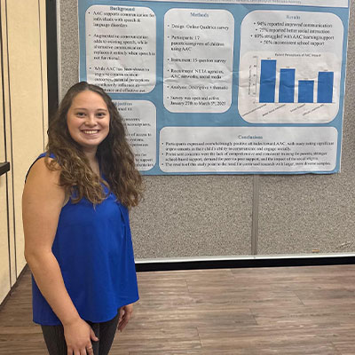 a student presents a poster