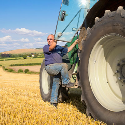 Image of a person entering a tractor