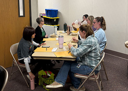 participants sit at a table