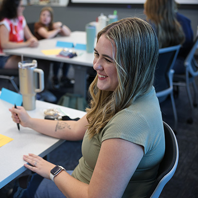 a student sits in a college class