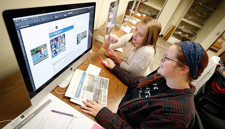 Students working on antelope newspaper