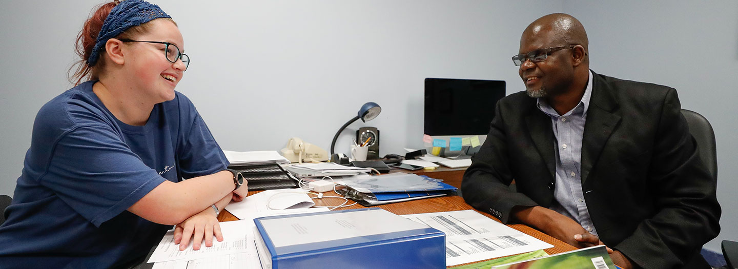 UNK student speaking with Professor in his office