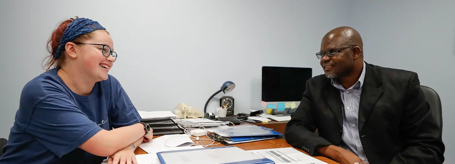 UNK student speaking with Professor in his office