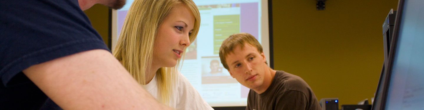 Students working together at a computer