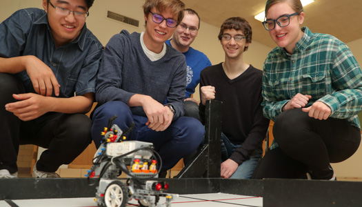 UNK students work on a robotics project