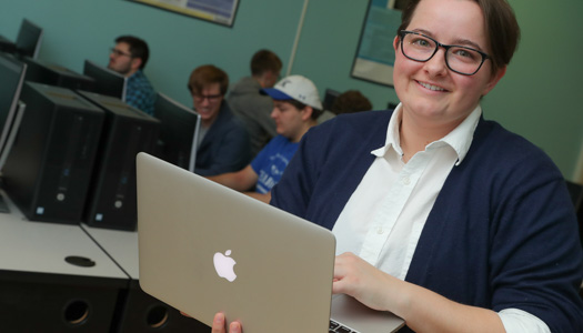 University of Nebraska at Kearney Cyber Security Students working on a computer