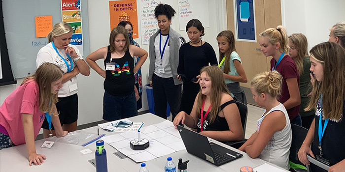 Students working on a project at GenCyber camp