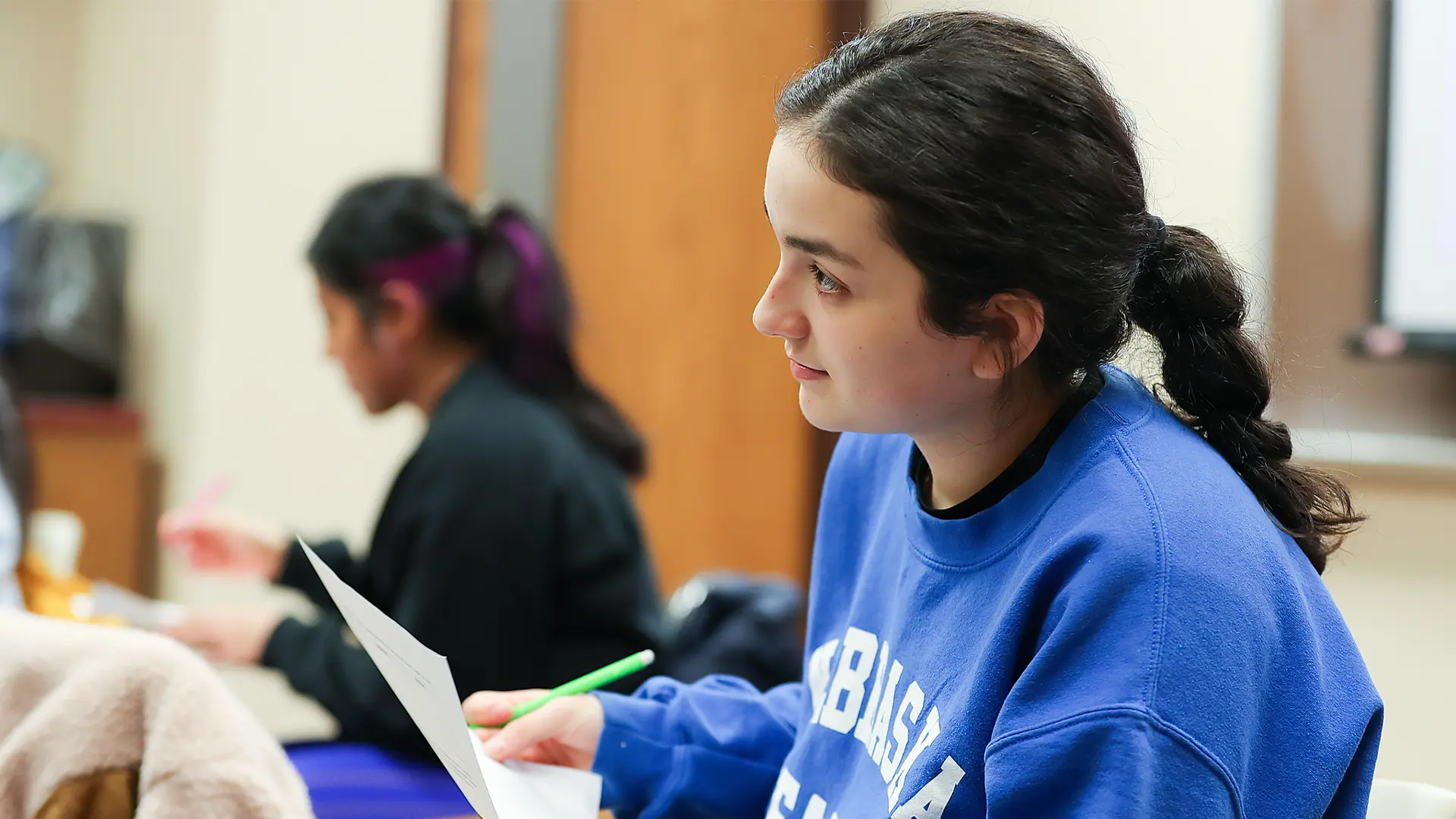 a student sits in class