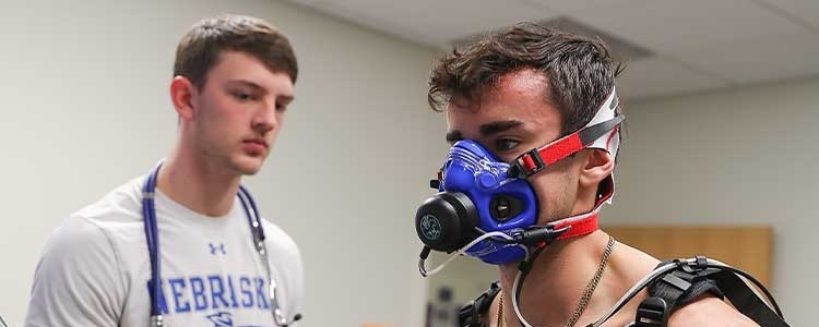 students work together in an exercise science clinical lab