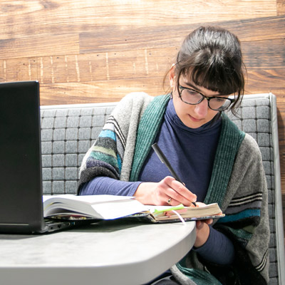 a student takes notes