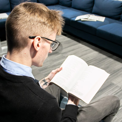 a student reads a book