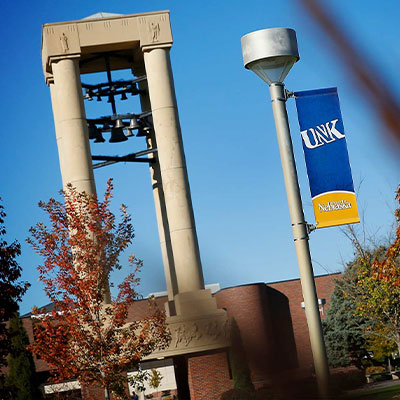 the UNK bell tower on a sunny day