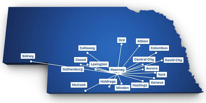 a blue map of nebraska showing the different cities that contain hospitals partnered with UNK