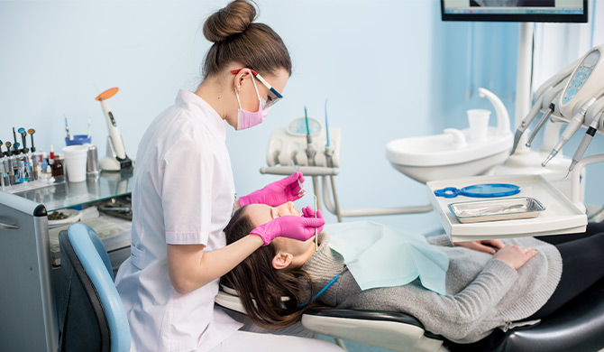 Dentists performing a dental procedure