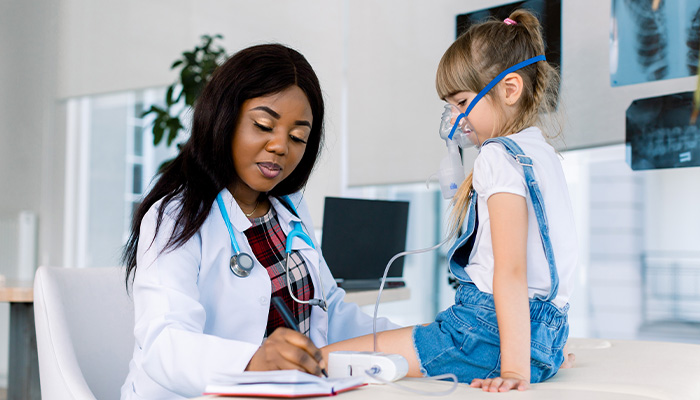 Respiratory therapist with patient