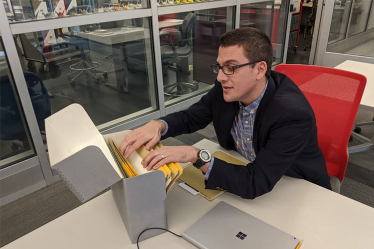 Dr. David Vail works at a desk