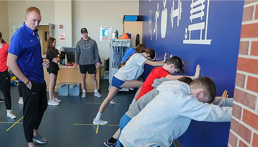 students working on fitness training