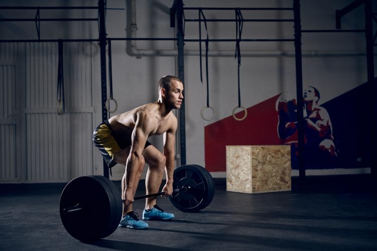 Man completing dead-lift