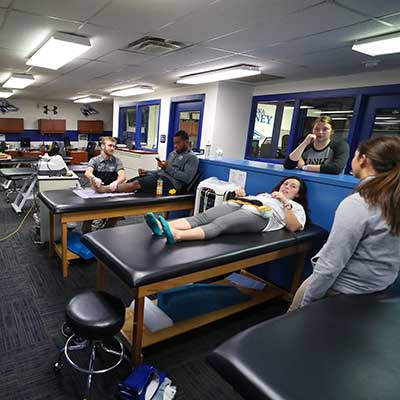 Students in the athletic training facility