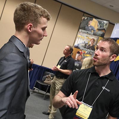 a student talks with an employer at the ID Career Event