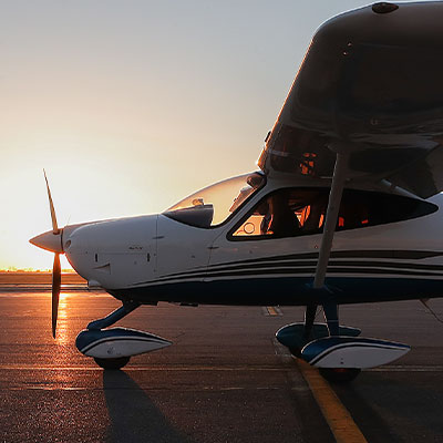 Student in plane on runway