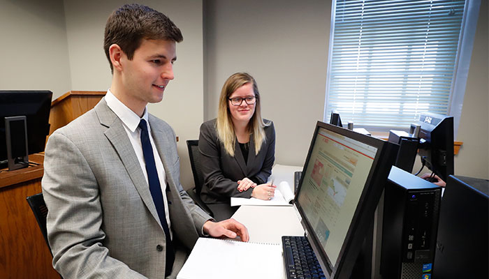 Business students at computer