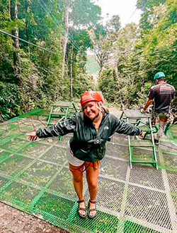 a student gets ready for a zipline in costa rica