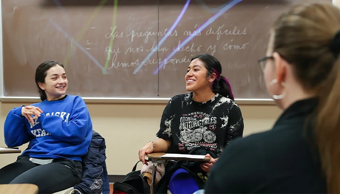 students sit in a spanish class