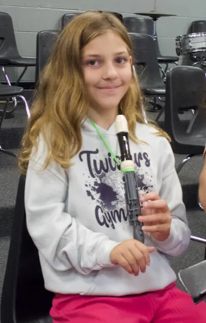Mattie poses with her recorder