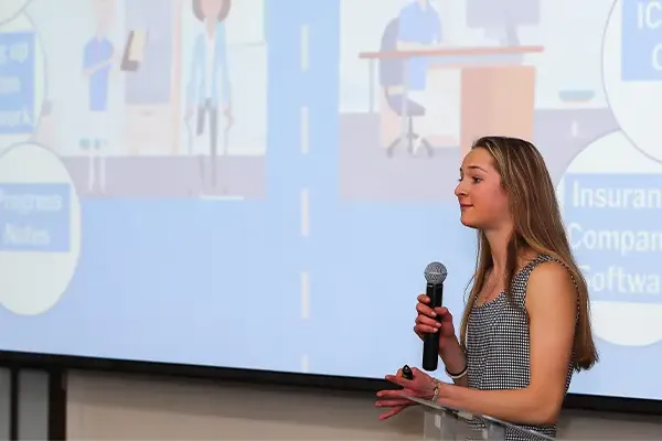 a student delivers a presentation