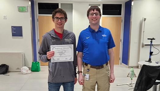 the second place team holds a certificate