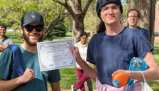 the second place team holds a certificate