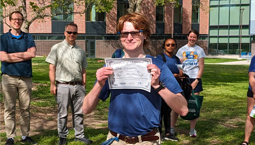 the third place team holds a certificate