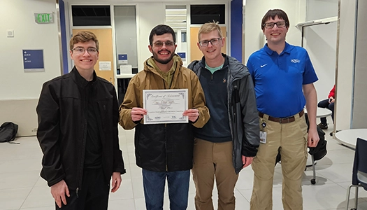the third place team holds a certificate