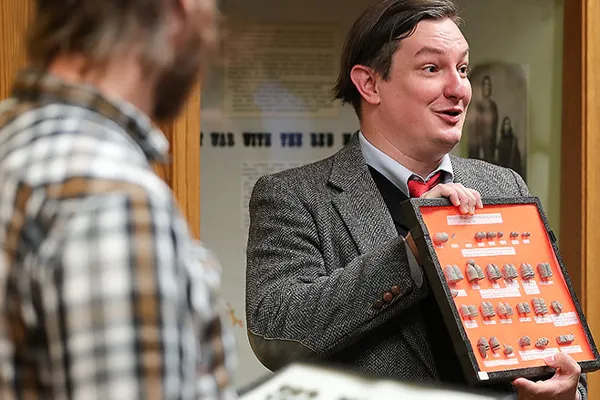 a history professor showcases artifacts