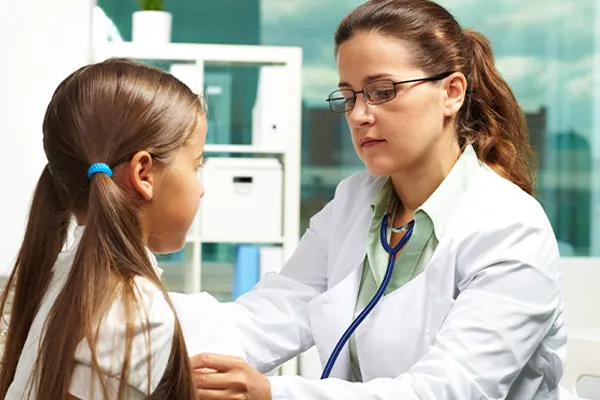 a Physician assistant works with a patient