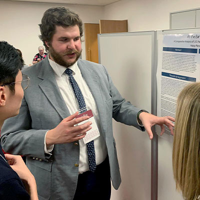image of undergraduate student presenting research