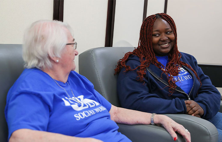 a unk social work student works with an elderly woman