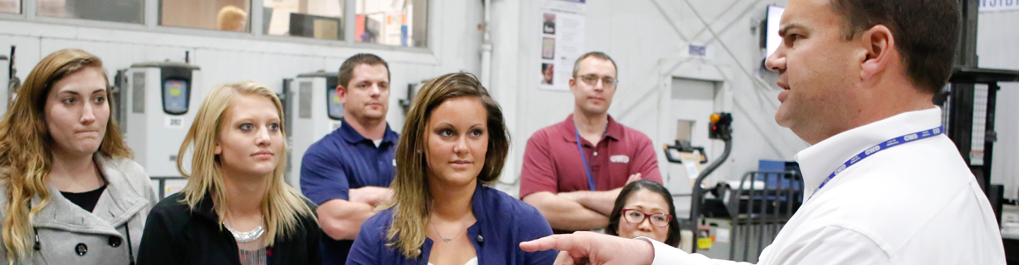 Students touring supply chain facility