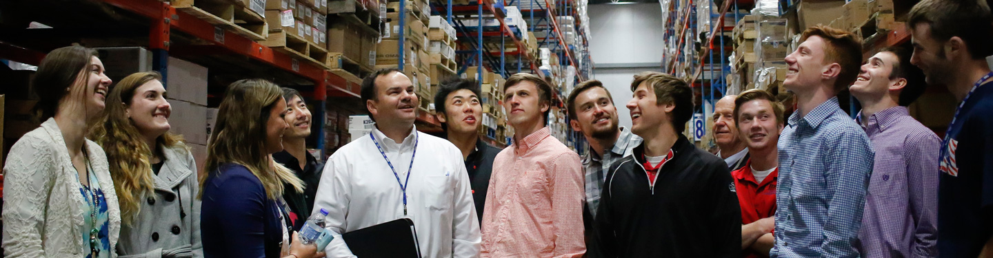 Students on tour of warehouse